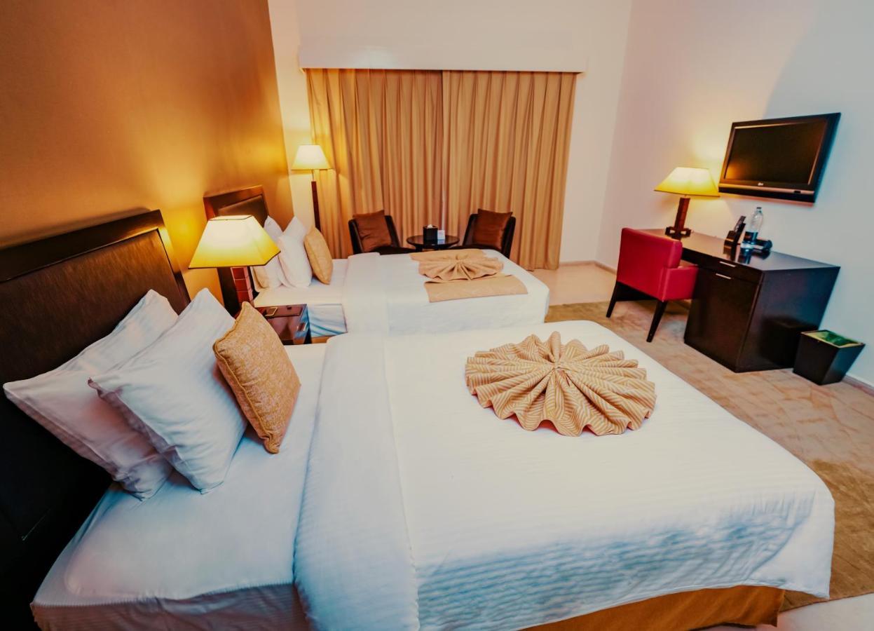 Villaggio Hotel Абу-Даби Экстерьер фото